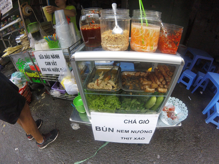 stall food in a street market in ho chi minh