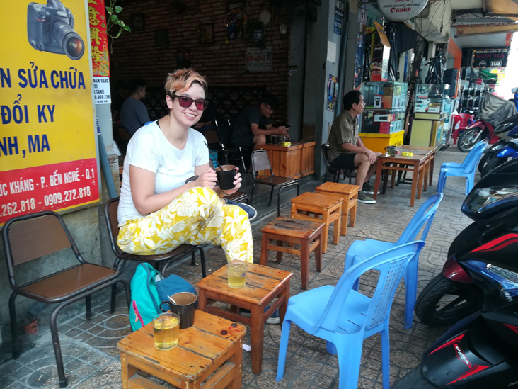 drinking ice coffe in ho chi minh coffe shop sitting on the street
