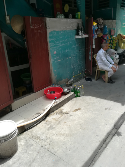 People living almost in the street in ho chi minh