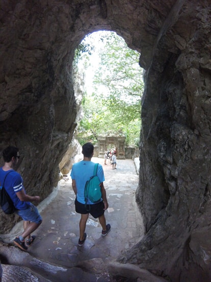 going out from a cave in marble mountains