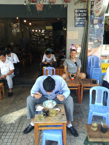 traditional coffe shop all people sitting there see to the street