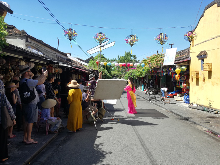 filming a video clip in hoi an with a girl singing