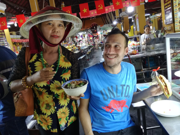 a funny girl posing with us in hoi an old market