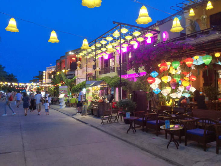 the night market works in an island just in front of the old town in hoi an