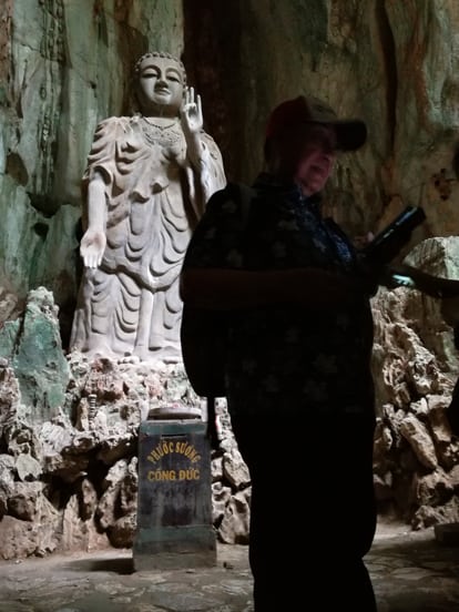 a huge image of buda made with marble in marble mountains da nang