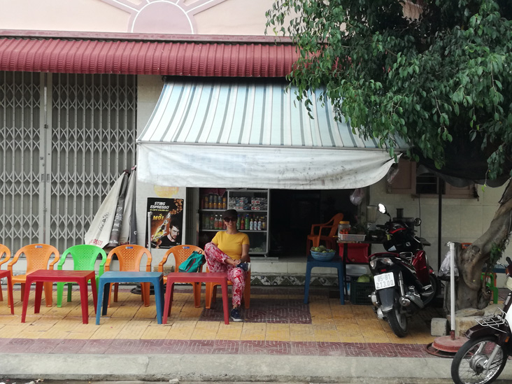 gilda sitting in a shop in po klong garai