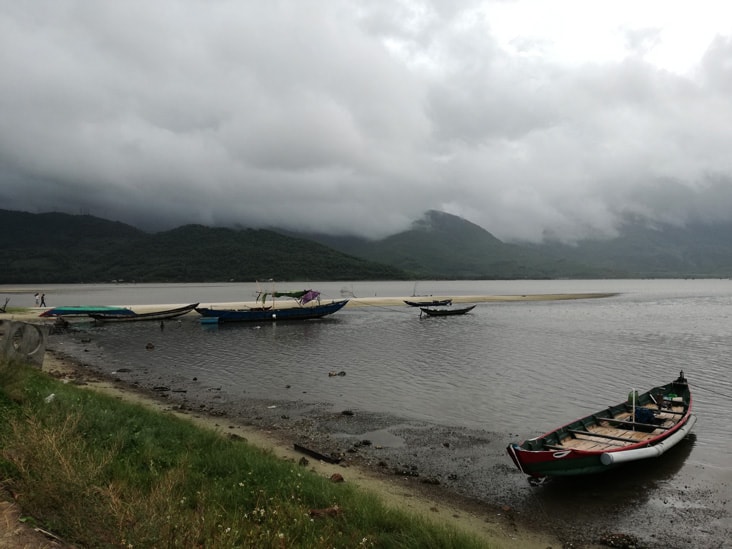 amazing view of a river with boats in hue