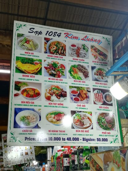 sign with prices in a market in ho chi minh city