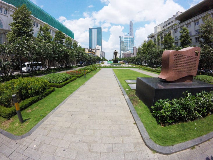 Nguyen Hue Pedestrian Square in ho chi minh, at the end of the street is a statue of ho chi minh revolutionary leader